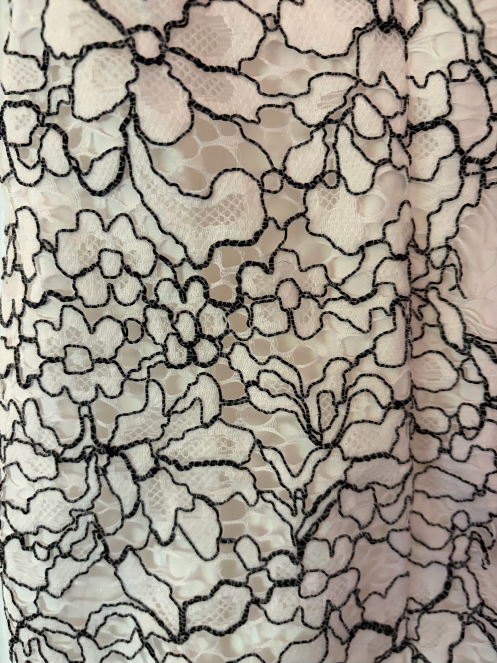 Elegant White Lace Top with Black Floral Trim